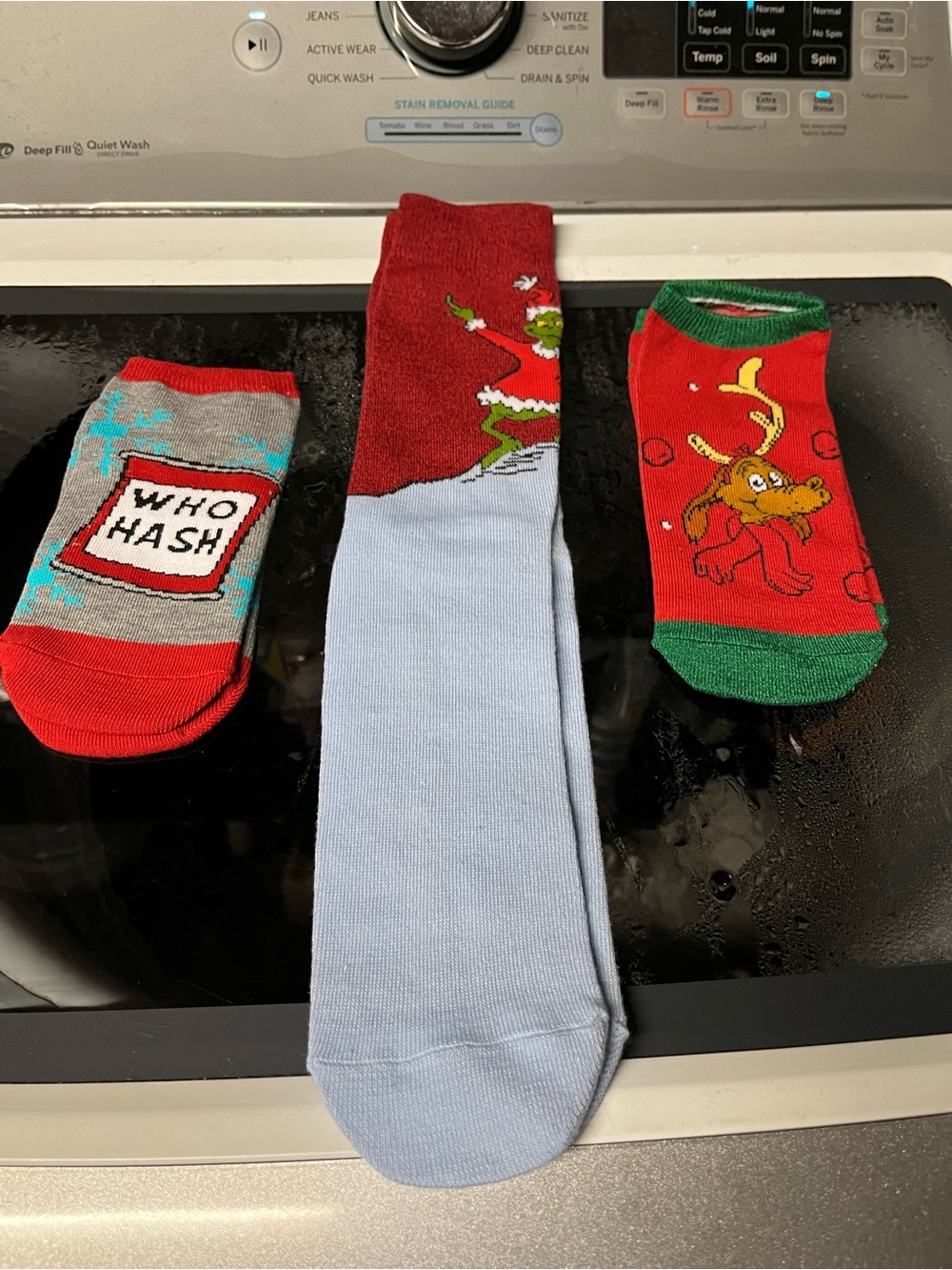 Three pairs of Grinch socks Giveaway